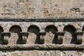 Italy. Bari. Castello Svevo di Bari, medieval fortress from the 13th century. Detail of the line of hanging arches