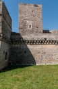 Italy.  Bari. Norman-Swabian castle, 13th-16th century.  Southern side. The moat and the Tower of the Minors Royalty Free Stock Photo