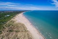 Italy, the beach of the Adriatic sea. Rest on the sea near Venice. Aerial FPV drone photography.