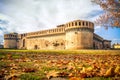 Italy castle autumn leaves ground park yellow tone background me Royalty Free Stock Photo