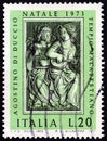 ITALY - CIRCA 1973: A stamp printed in Italy shows musician angels by Agostino di Duccio, circa 1973.