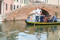 Italy, Comacchio, boat with tourists