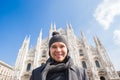 Italy, excursion and travel concept - funny guy taking selfie in front of cathedral Duomo in Milan Royalty Free Stock Photo