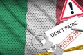 Italy flag and police handcuffs with inscription Don`t panic on white paper. Coronavirus or 2019-nCov virus concept