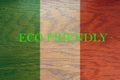 Italy flag on wooden background for global eco friendly environment, ecological and environmental saving and go green country