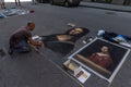 italy, florence 2018 - artist painting a copy of monalisa on a street in florence