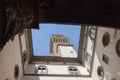 Arnolfo Tower from inner yard at medieval Palazzo Vecchio, Florence, Tuscany, Italy Royalty Free Stock Photo