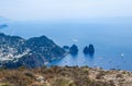 Italy. Island Capri. Faraglioni rocks and boats from Monte Solaro Royalty Free Stock Photo