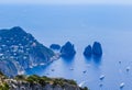 Italy. Island Capri. Faraglioni rocks and boats from Monte Solaro