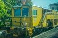 Italy - 28 June 2018: The Plasser and Theurer on Trenitalia in the italian outskirts track