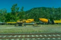 Italy - 28 June 2018: The yellow Plasser and Theurer on Trenitalia in the italian outskirts track