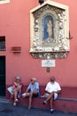 Italy. Liguria. The fishing village of Camogli. Elderly people relaxing