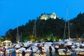 Italy. Liguria. Portofino. The harbor with Castello Brown by night