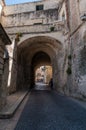 Italy. Matera. The medieval Porta de Suso, the upper gate, from Via Duomo, part of the main access to the ancient Civita