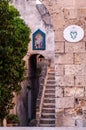 Italy. Matera. The Sassi. Tipical old house with external staircase and niche with sacred image