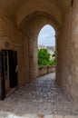 Italy. Matera. Sasso Barisano. Covered public paved stairway between the ancient houses