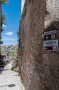 Italy. Matera. Touristic itinerary between the ancient Rioni Sassi. Glimpse of a paved pathway inside the Sasso Caveoso