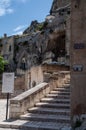 Italy. Matera. Touristic itinerary between the ancient Rioni Sassi. Glimpse of a scenic stairway inside the Sasso Caveoso