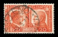 ITALY - 5 May 1941: Italian historical stamp: German-Italian brotherhood in arms, Portraits of Hitler and Mussolini with symbols