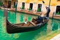 Italy - May 20, 2019: View on canal with gondola boat and motorboat water / river Royalty Free Stock Photo