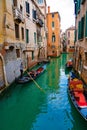 Italy - May 20, 2019: View on canal with gondola boat and motorboat water / river Royalty Free Stock Photo