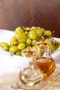 Wine and grapes are the offerings in the mass of the first communion