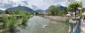 Italy, Merano, 03 May 2019: Panoramic image of Merano, Thermal source, multi-colored landscape, bridge on the river