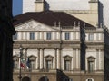 italy milan city landmark building of La Scala opera facade view at sunrise illuminated neo-classical house Royalty Free Stock Photo