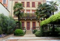 Italy, Milan, villa with palm trees and bushes Royalty Free Stock Photo