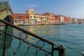 Italy, Murano water boats canal and traditional buildings