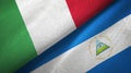 Italy and Nicaragua two flags textile cloth, fabric texture