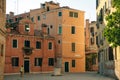 Italy - nov, 2021. The cityscape and architecture of Venice. Urban canal and boats on it