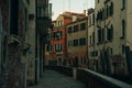 Italy - nov, 2021. The cityscape and architecture of Venice. Urban canal and boats on it