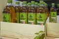 Refined olive oil in Primadonna brand bottles on shelf