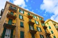 Savona Green-Iron Balconies and Yellow Building, Picturesque Neighborhood, Travel Italy Royalty Free Stock Photo