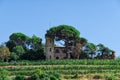 Italy, old winery on the top of the hill with vineyards around Royalty Free Stock Photo