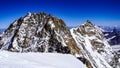 Italy, Pennine Alps, Monterosa Mountains, viewpoint from Zumsteinspitze Peak to Dufourspitze and Nordend Peaks Royalty Free Stock Photo