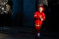 Italy, perfugas, sardegna, sassari, cagliari, 25-02-2020 happy child dressed as firefighter for carnival with yellow suit and helm Royalty Free Stock Photo