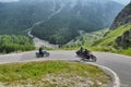 Group of vintage motorbike riders in landscape Royalty Free Stock Photo