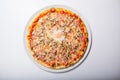 Italy pizza with egg yolk ham mushrooms on a white background Royalty Free Stock Photo