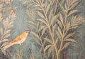 Italy, Pompeii - Luxury roman house interior, fresco detail with bird in a garden