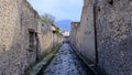 Italy, Pompeii - October 2021: Street view of ancient Pompeii with tourists