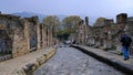 Italy, Pompeii - October 2021: Street view of ancient Pompeii with tourists