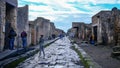 Italy, Pompeii - October 2021: Street view of ancient Pompeii with tourists