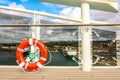 Lifebuoy hangs on top deck of MSC WORLD EUROPA cruise ship. Lifebelt at passenger ferry. Royalty Free Stock Photo