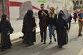 Italy, Rome, October 07, 2018, Nuns in black clothes walking down the street of Rome among tourists