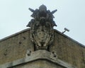 Italy, Rome, Piazza del Risorgimento, embossed coat of arms on the wall of the Vatican Royalty Free Stock Photo