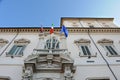 Italy, Rome, Quirinal palace balcony and flags at main building front.