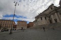 Sky, town, square, landmark, city, plaza, urban, area, building, infrastructure, wall, street, road, neighbourhood, cloud, daytime