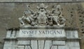 Italy, Rome, 104 Viale Vaticano, entrance gate to the Vatican Museums, statues and coat of arms over the front door Royalty Free Stock Photo